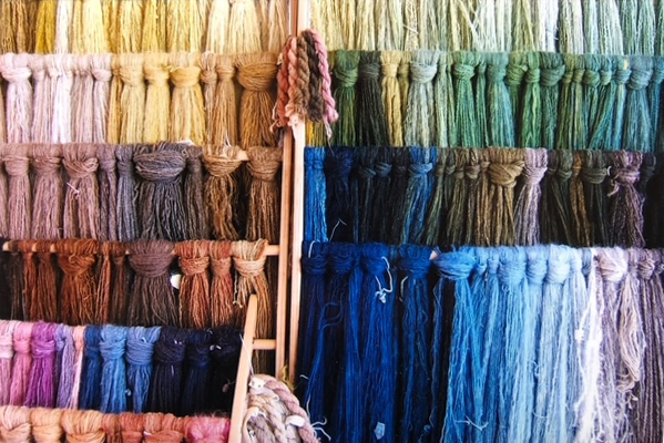 Skeins of fiber dyed by Vicki Fraser using natural organic dyes.